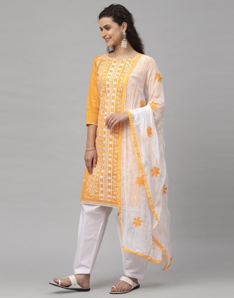 Dynamic Turmeric Yellow Cotton Embroidered Unstitched Salwar Suit | Sudathi