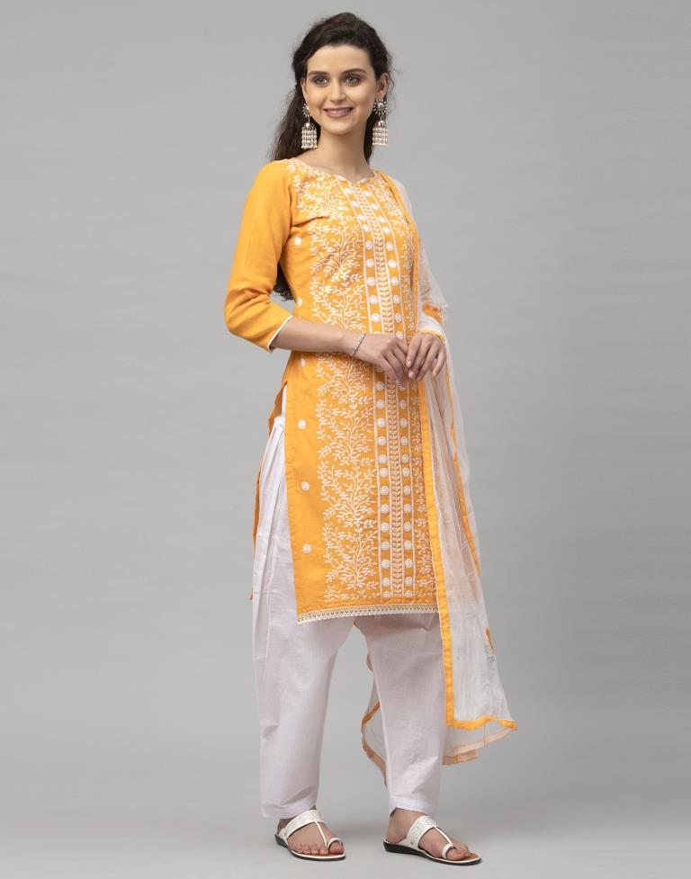 Dynamic Turmeric Yellow Cotton Embroidered Unstitched Salwar Suit | Sudathi