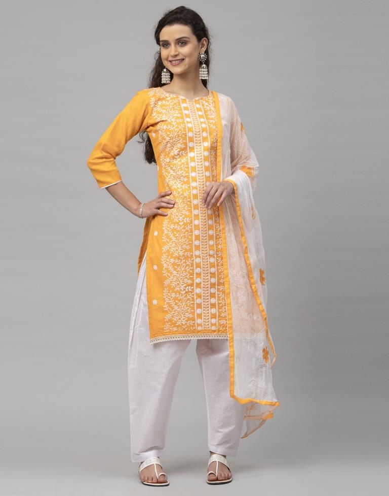 Dynamic Turmeric Yellow Cotton Embroidered Unstitched Salwar Suit | Sudathi