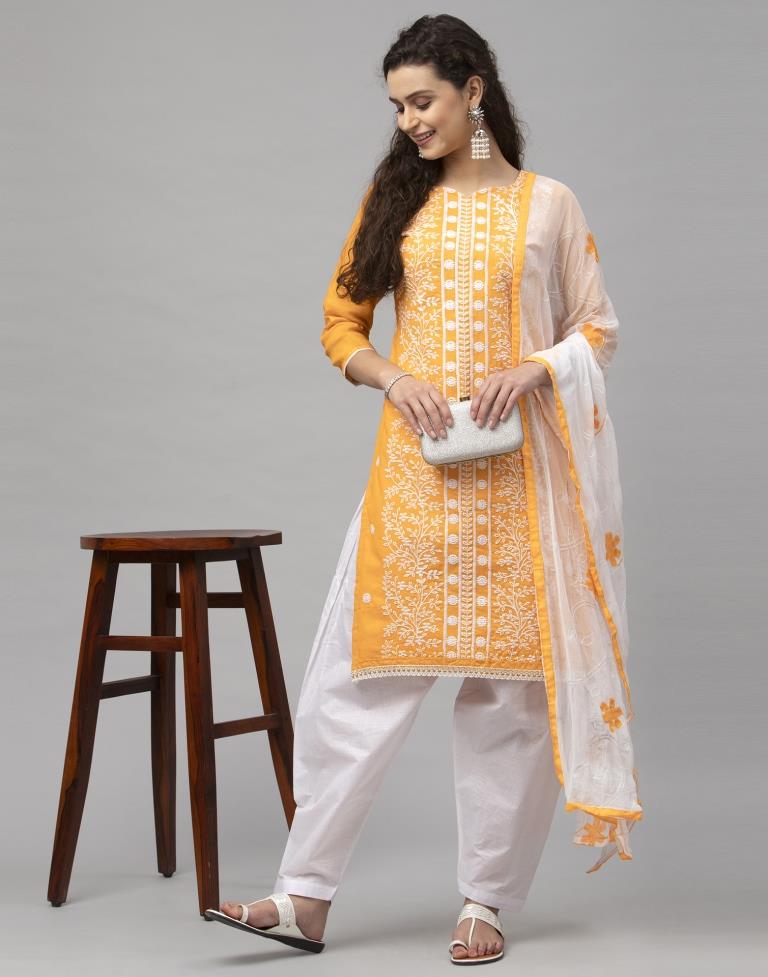 Dynamic Turmeric Yellow Cotton Embroidered Unstitched Salwar Suit | Sudathi