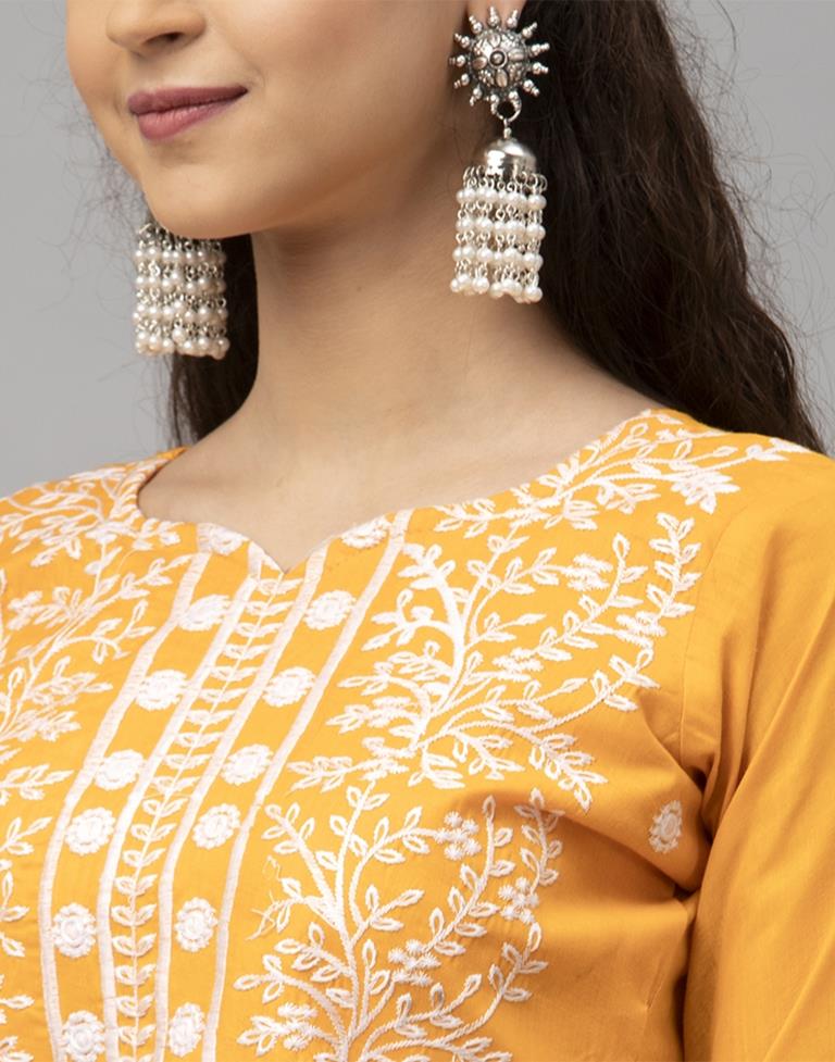 Dynamic Turmeric Yellow Cotton Embroidered Unstitched Salwar Suit | Sudathi