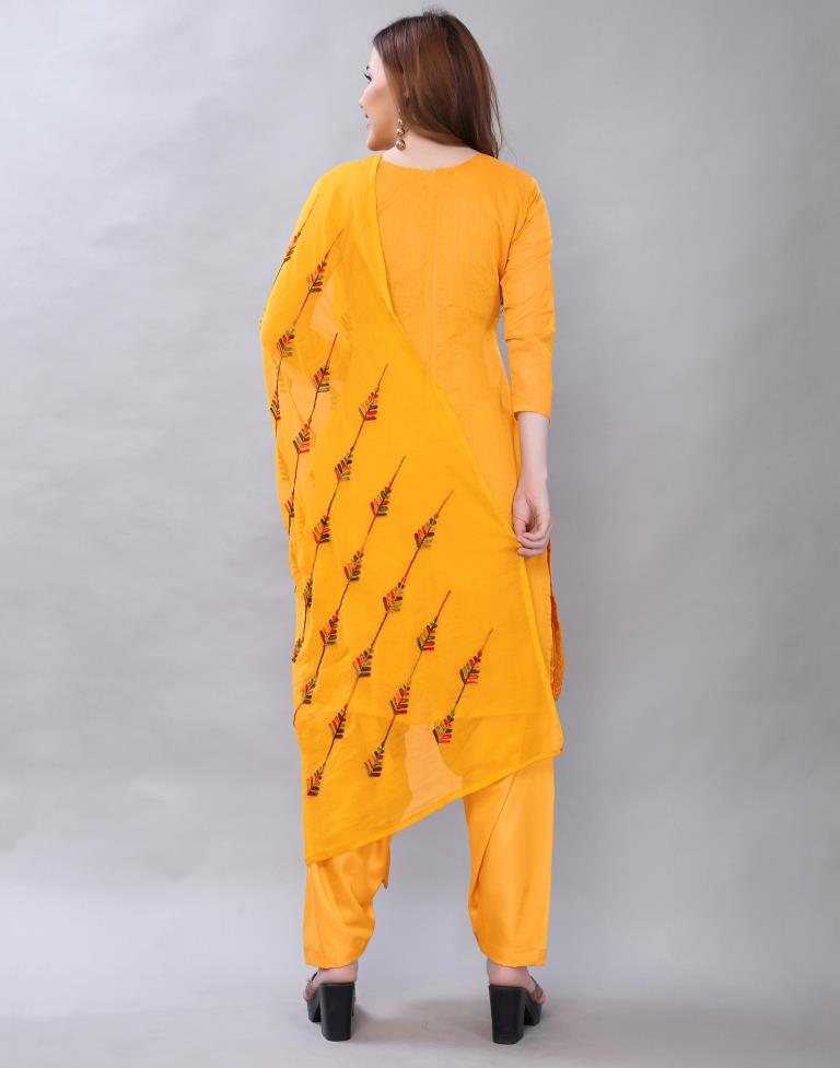 Alluring Turmeric Yellow Cotton Embroidered Unstitched Salwar Suit | Sudathi