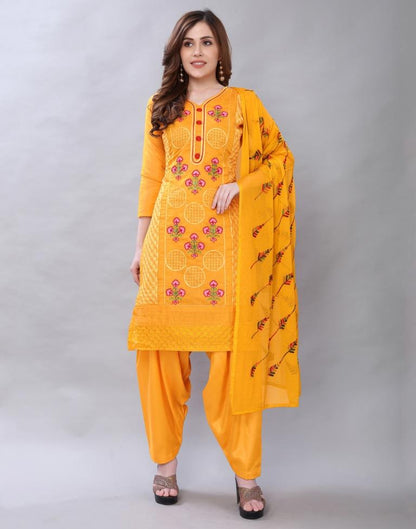 Alluring Turmeric Yellow Cotton Embroidered Unstitched Salwar Suit | Sudathi