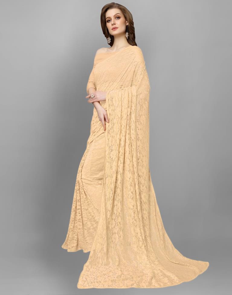 Beige Coloured Russell Net Partywear saree | Leemboodi