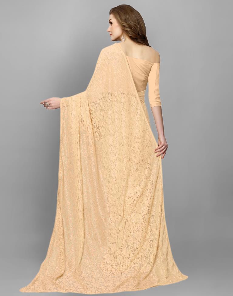 Beige Coloured Russell Net Partywear saree | Leemboodi