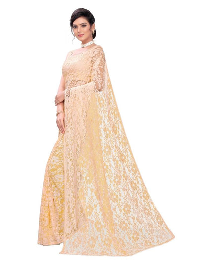 Light Orange Coloured Embellished Russel Net Saree | Leemboodi