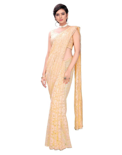 Light Orange Coloured Embellished Russel Net Saree | Leemboodi