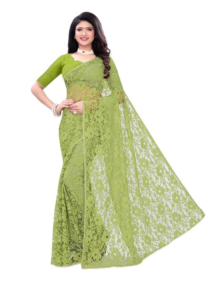 Parrot Green Coloured Embellished Russel Net Saree | Leemboodi