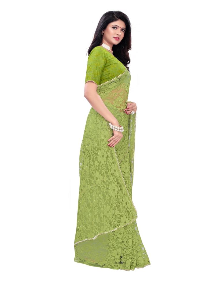 Parrot Green Coloured Embellished Russel Net Saree | Leemboodi