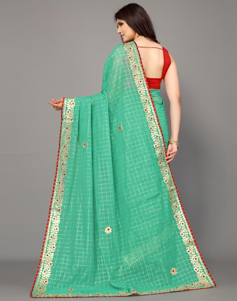 Turquoise Green Cotton Geometric Woven Saree | Leemboodi
