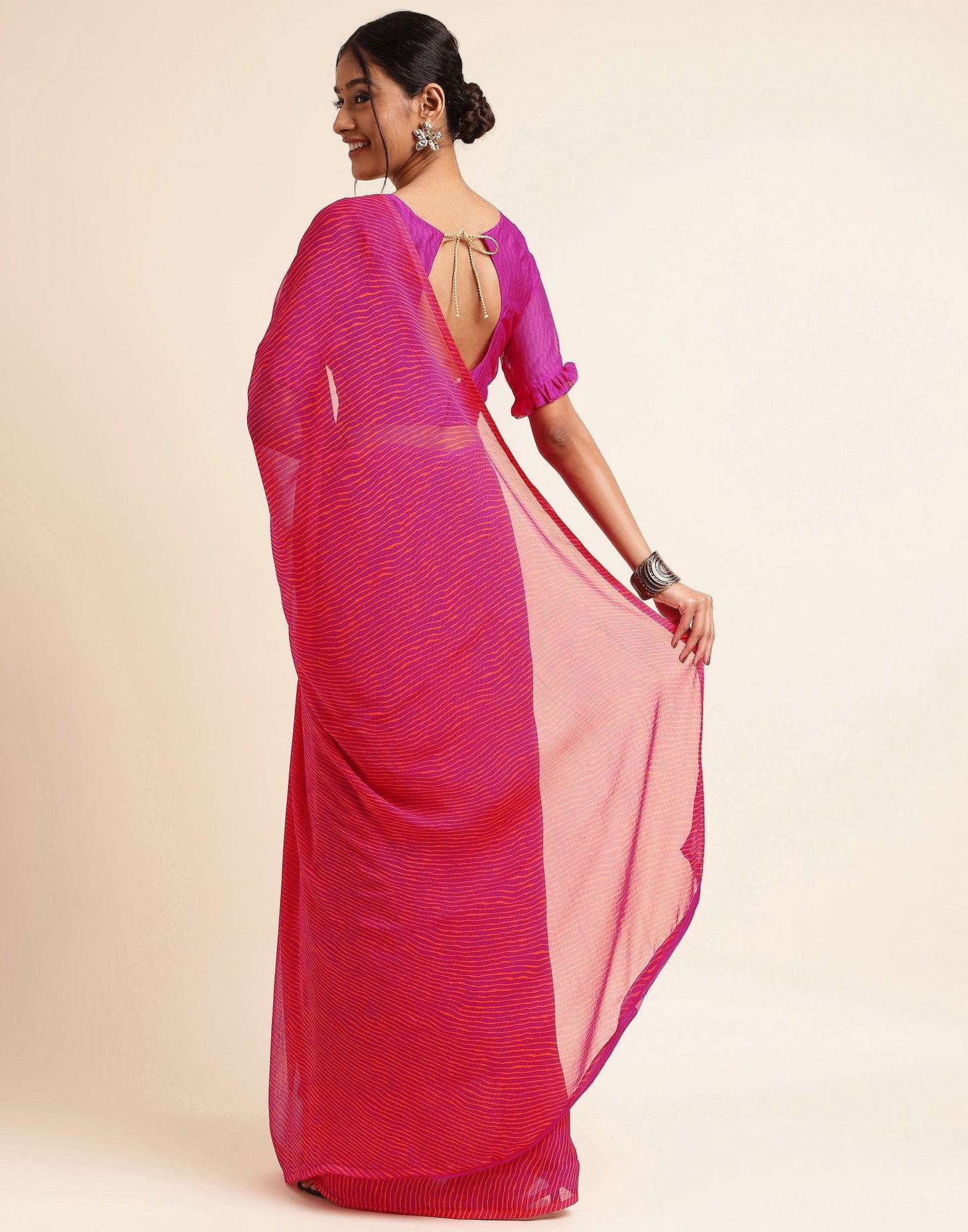 Rani Pink Chiffon Leheriya Printed Saree