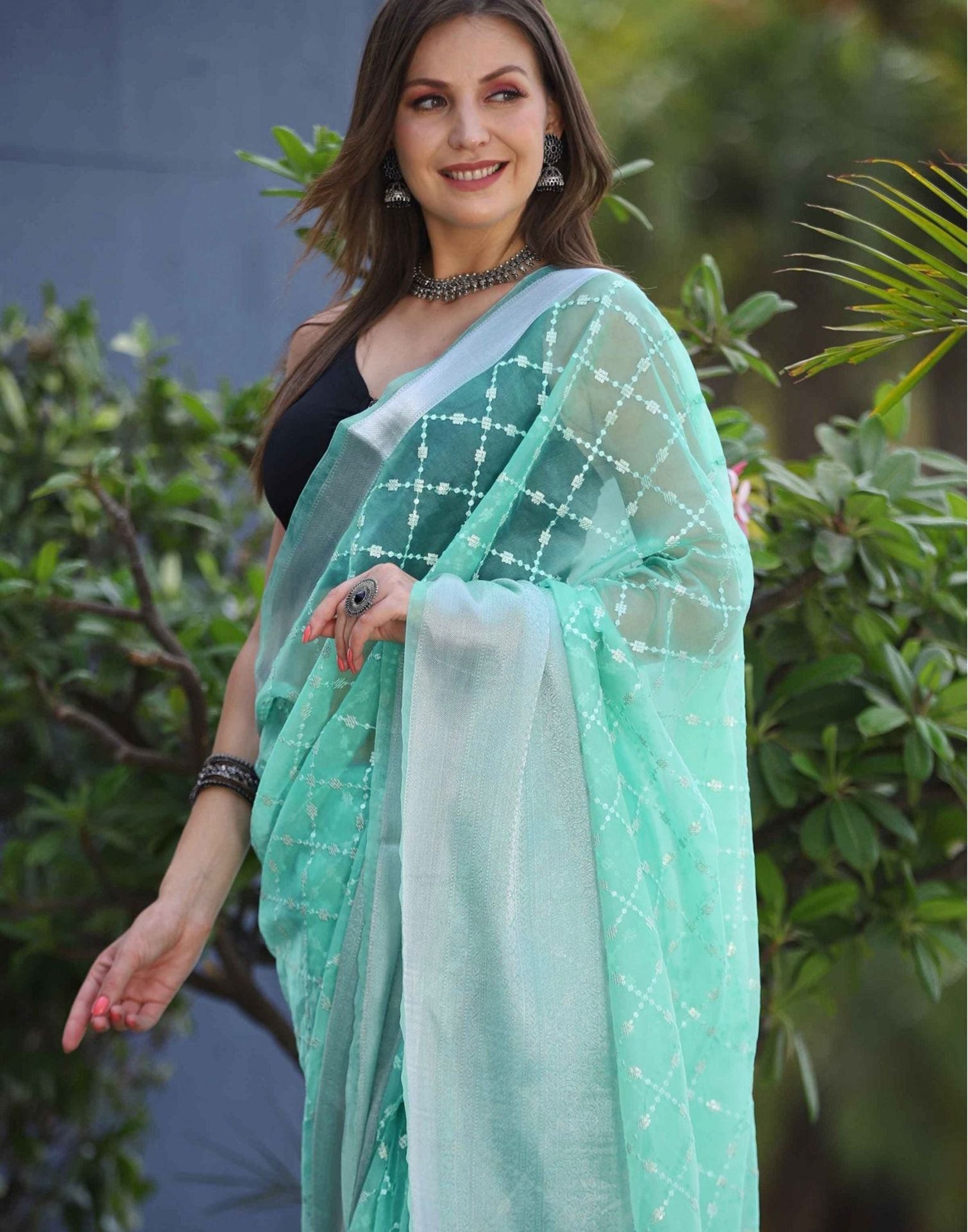 Turquoise Organza Sequence Saree | Leemboodi
