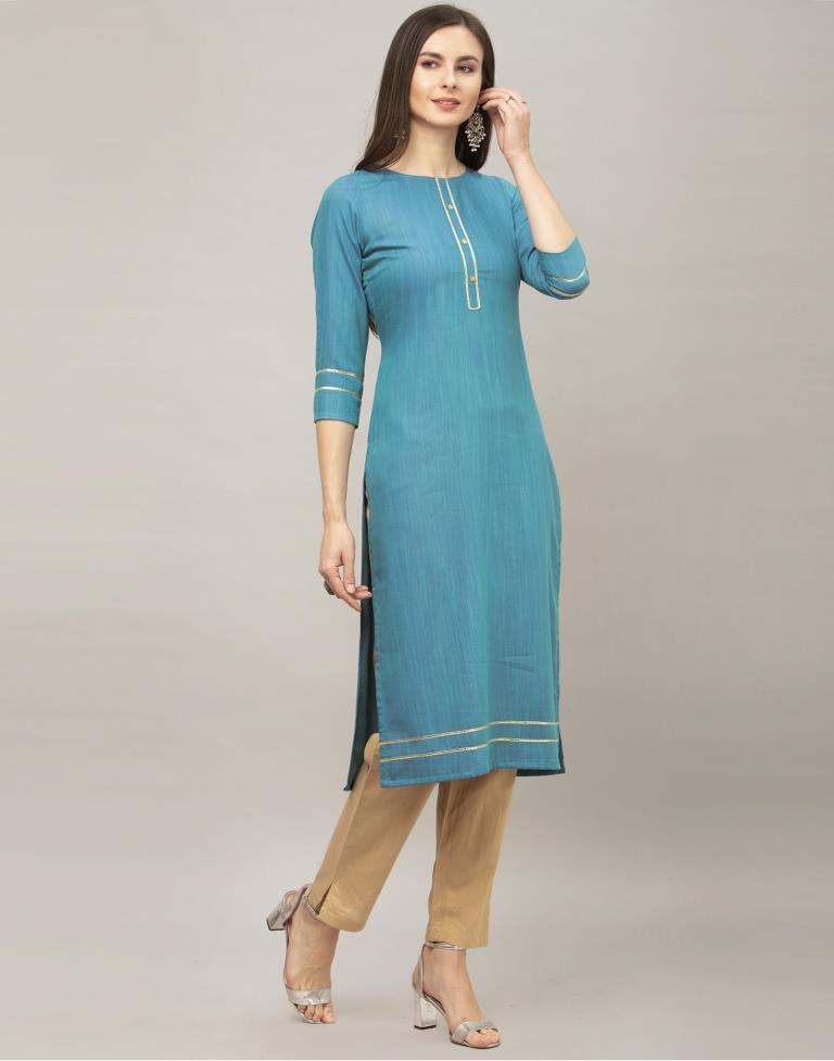 Mesmerising Teal Blue Coloured Dyed, Laced Rayon Kurti | Sudathi