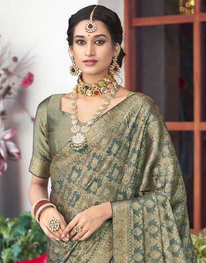 Dark Green Self Woven Silk Saree
