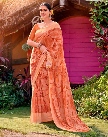 Dusty Peach Georgette Woven Saree