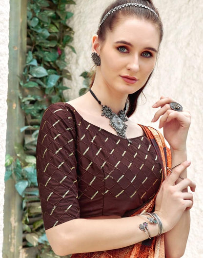 Rust Georgette Printed Saree