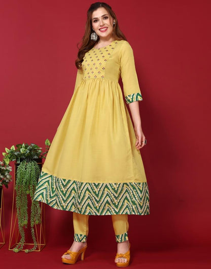 Yellow Chinnon Embroidery A-Line Kurta With Pant And Dupatta