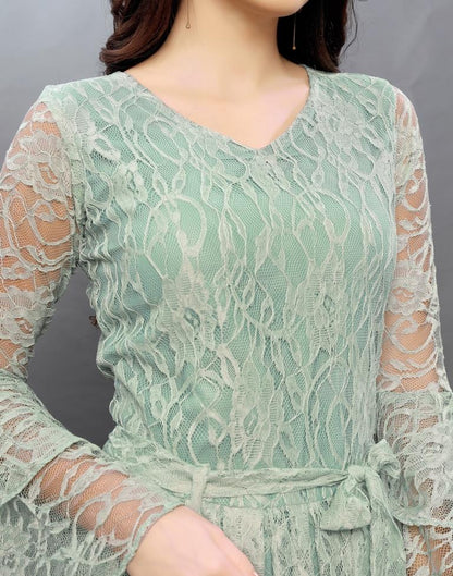 Sensuous Aqua Green Coloured Net Russell Net Dress | Sudathi